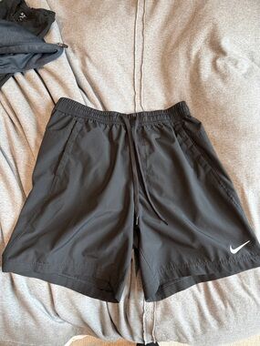 Nike Men’s Black Athletic Shorts with White Swoosh